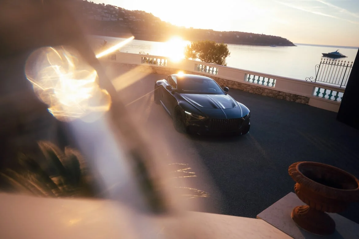 BRABUS BODO supercar at sunset over Mediterranean sea — high angle exterior