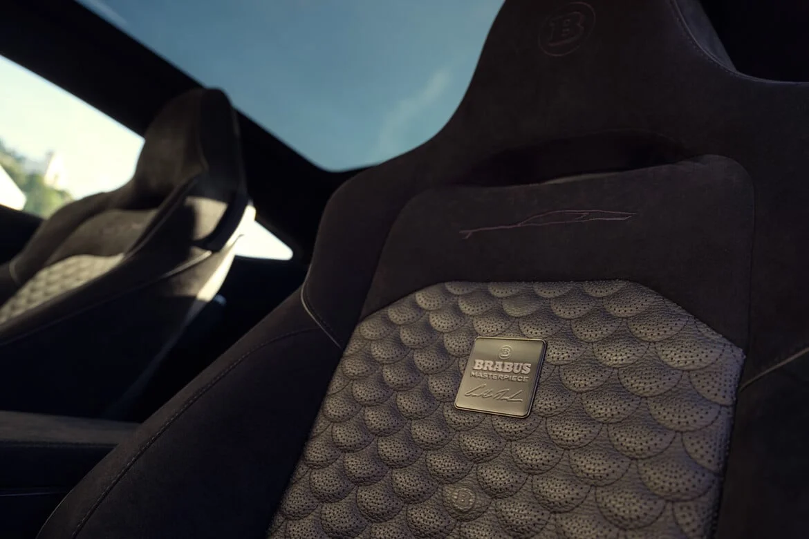 BRABUS BODO seat detail — fish-scale quilted leather pattern with BRABUS Masterpiece plaque